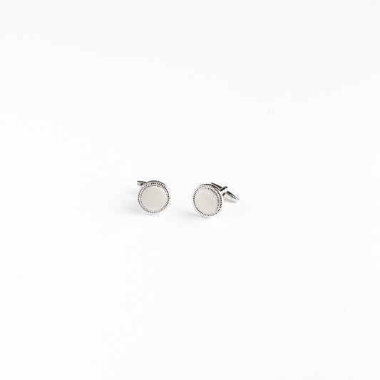 Silver Round Cufflinks With Edge Detailing - Oscar Hunt